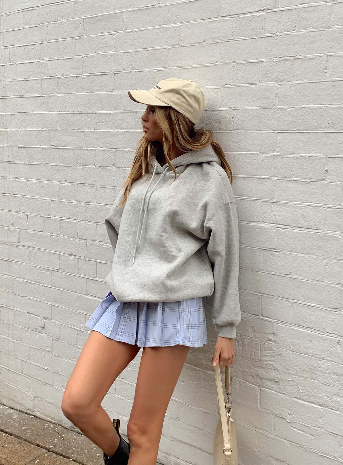   side view of model wearing Princess Polly No Boundaries Mini Skirt 