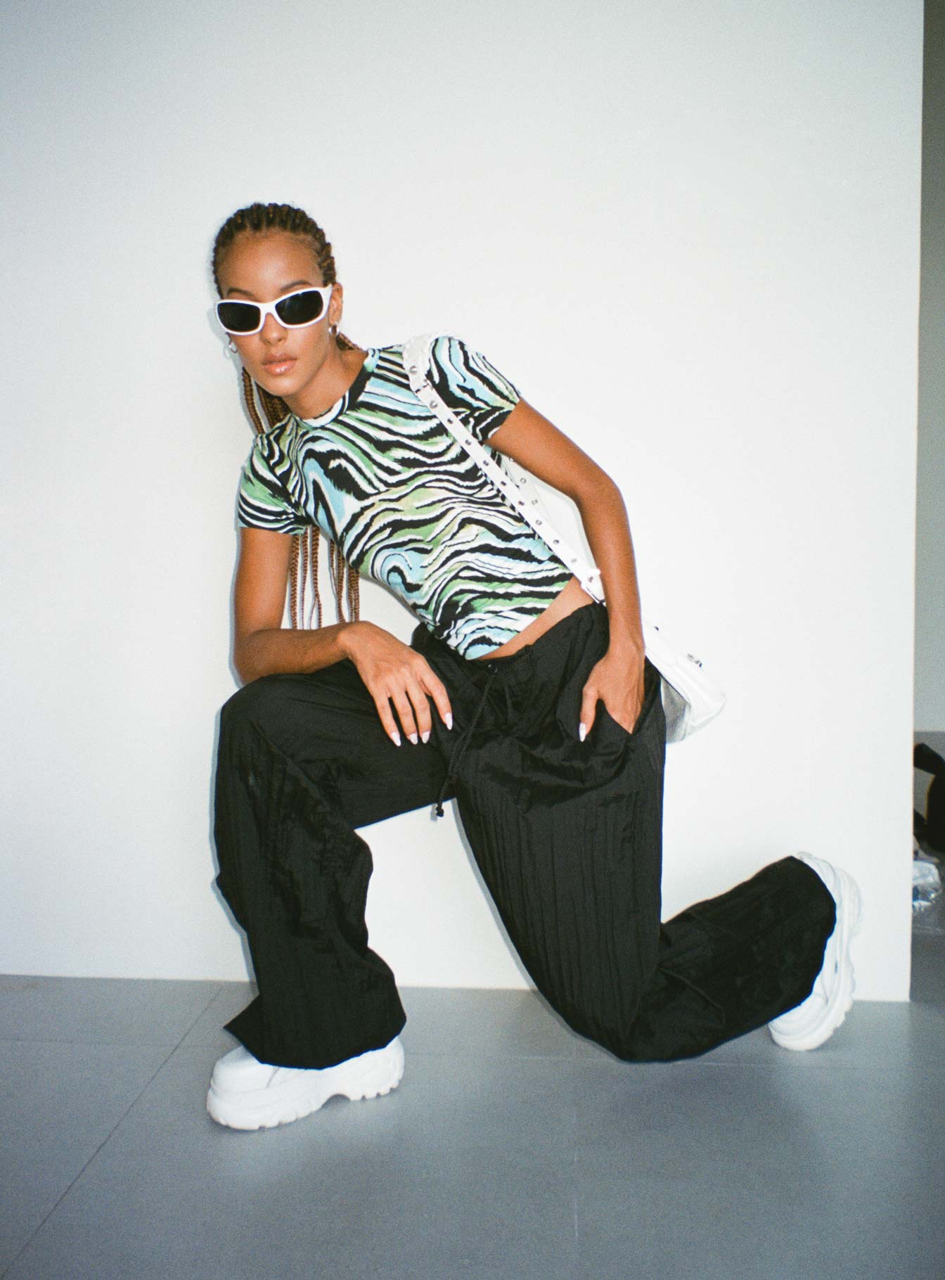 front view of model wearing Princess Polly Motel Surtie Top Warped Zebra Blue Short Sleeves Crew Neck 