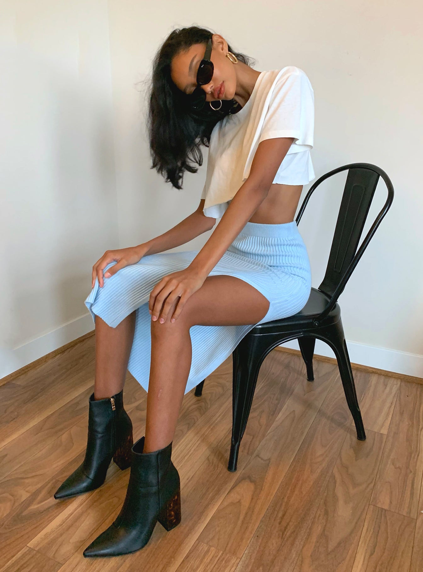   side view of model wearing Princess Polly Tanna Midi Skirt Blue 