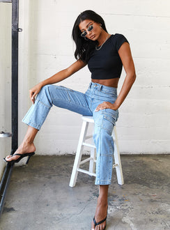 side view of model wearing Princess Polly The Stacey Jeans Denim Blue High Waisted 