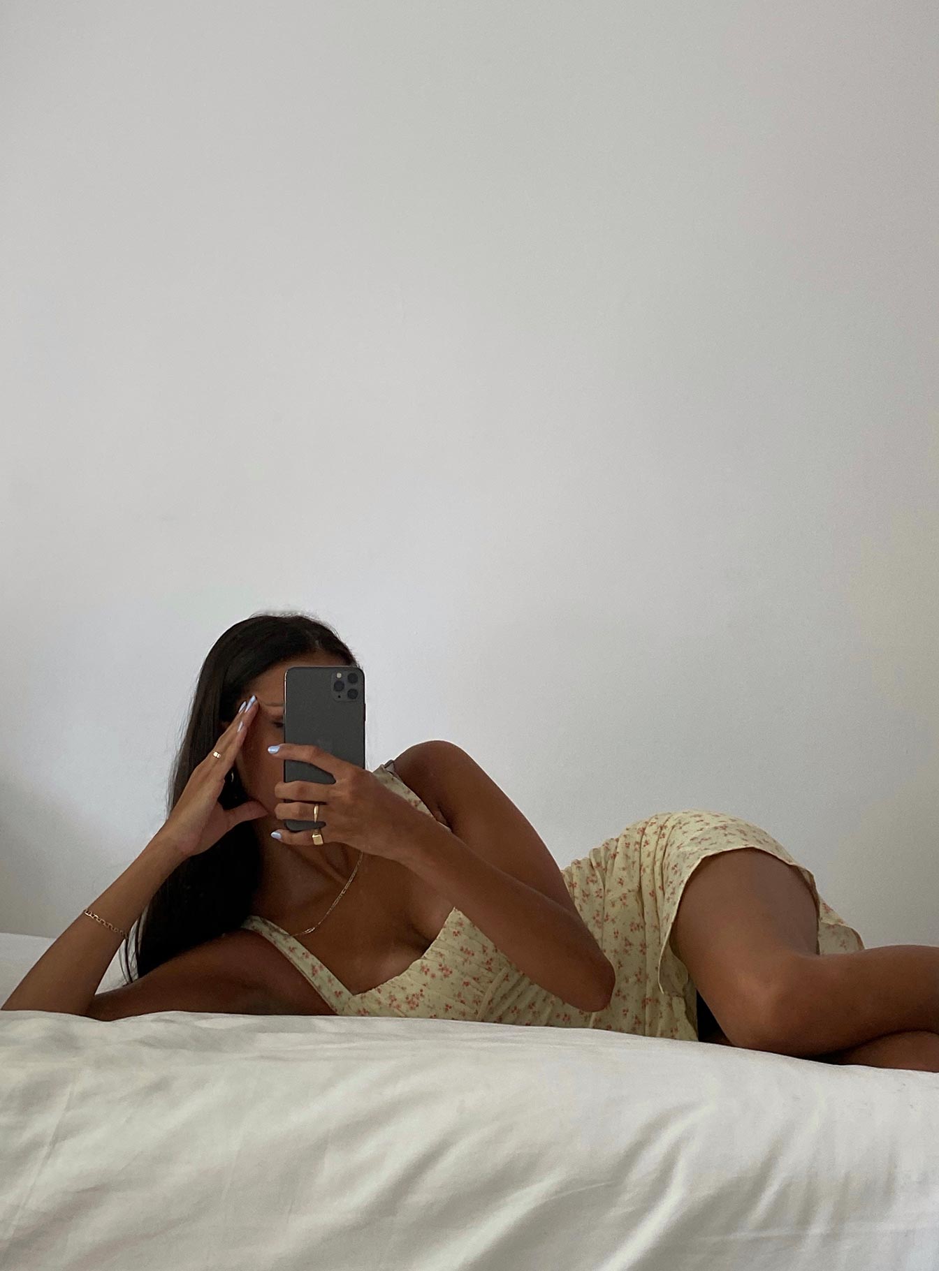 side view of model wearing Princess Polly Freya Mini Dress Yellow Floral 